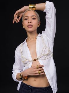 A new addition to MISHO Couture, create the ultimate statement look with the Perla Bikini Top. Handcrafted in bronze, plated in 24k gold, adorned with strings of baroque pearls. Gemini Jewelry, Top Pearl, Ear Cap, Zodiac Jewelry, New Launch, Summer Jewelry, 22k Gold, Baroque Pearls, Free Bag