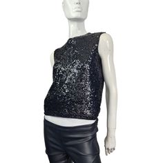 Made in Hong Kong, black sequin wool sequined top. Fits S/M best. 18" across 19" long sleeveless back zipper  sequins missing on one shoulder as shown. 1 lb shipping weight  * Good preowned vintage condition with no major flaws to note. Usual wear is consistent with age. Sold as IS. *ALL SALES FINAL. NO RETURNS. * Please review all pictures as they are part of the listing. Ask questions! * Please review all shop policies before completing the transaction.  * Bundle up for combined shipping. * Pl Contrast Sequin Sleeveless Party Top, Black Party Top With Contrast Sequin, Black Bohemian Sequin Tops, Casual Black Sequined T-shirt, Vintage Sleeveless Sequin Top, Sequined Top, Sequin Top, Black Sequins, Black Wool