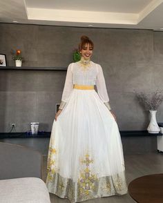 Classy Habesha Dress Handwoven Habesha Kemis Beautiful Habesha Libs Eritrean Dress ሀበሻ ቀሚስ ሀበሻ ልብስ Fitted Dresses With Pallu For Traditional Ceremonies, Anarkali Style Long Sleeve Maxi Dress For Traditional Ceremonies, Traditional Fitted Saree Dress, Bollywood Style Maxi Dress For Traditional Ceremonies, Traditional Semi-stitched Cutdana Dresses, Traditional Cutdana Dresses For Diwali, Resham Embroidery Floor-length Dress For Traditional Ceremonies, Floor-length Dresses With Resham Embroidery For Traditional Ceremonies, Traditional Floor-length Maxi Dress For Transitional Season