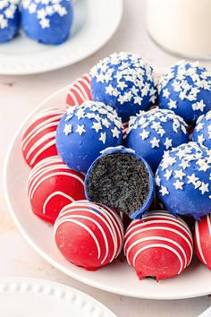 red, white and blue desserts are arranged on a plate