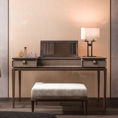 a desk with a mirror, lamp and stool next to it in a living room