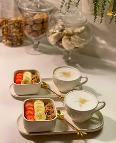 there are three bowls with different foods in them on the table next to each other