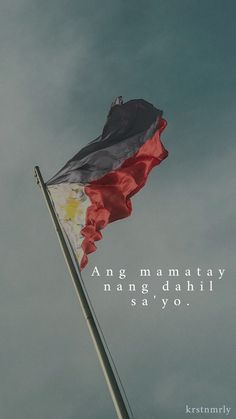 a flag flying in the wind with a quote below it that reads, angg mamatay nanng dahil say yo