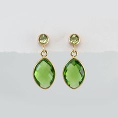 "Peridot Earrings - August Birthstone Earrings - Gold Earrings - Small Drop Earrings - Post Earrings - Green Earrings A pair of stunning Peridot drops earrings. The earring posts are 14k gold filled or sterling silver with beautiful bezel set stone. Earrings measure approx 0.75 inches long. Stones are 8mm x 12mm. Available in: Peridot Quartz Citrine Quartz Garnet Quartz Because I use natural stones, the stones may vary slightly in shape, shade and size. Earrings will be shipped wrapped in a Dele Green Teardrop Birthstone Earrings, Elegant Lime Green Earrings For Gift, Green Faceted Earrings For Anniversary, Green Peridot Earrings For Anniversary, Peridot Drop Earrings For May Birthstone, Peridot Earrings For May Birthstone Gift, Peridot Earrings Studs, Jewelry Gold Earrings, Schmuck Gold