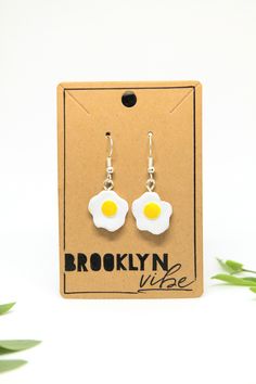 These fried egg earrings are the perfect gift for any foodie! These earring charms are about half and inch tall, hard plastic and are made with hypoallergenic silver plated posts. All of our charms are 100% hand sculpted, hand painted, and sealed with a clear vanish to keep it safe. These earring are for pierced ears and are very light to wear. Our items are not factory made, so no one item is a complete replica - expect a little handmade charm and love! Novelty Hypoallergenic Jewelry For Everyday, Everyday Novelty Hypoallergenic Jewelry, Handmade Novelty Earrings For Everyday, Novelty Everyday Dangle Earrings, Novelty Dangle Earrings For Everyday, Novelty Nickel-free Jewelry For Everyday, Everyday Novelty Dangle Earrings, Nickel Free Novelty Earrings For Everyday Wear, Novelty Hypoallergenic Earrings For Everyday