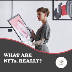 a woman with tattoos is looking at an art piece that reads, what are ntts, really?