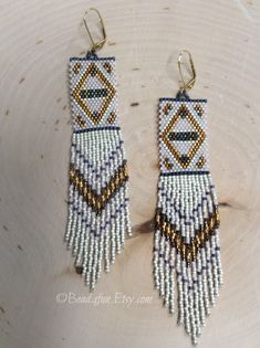 Long Fringe Beaded Boho Style Statement Earrings. Stage - Etsy Artisan White Earrings With Beaded Fringe, Bohemian White Chandelier Earrings For Festivals, Artisan Beaded Fringe Earrings For Jewelry Making, Bohemian White Beaded Fringe Earrings, White Beaded Fringe Jewelry For Crafting, White Bohemian Beaded Dangle Earrings, Unique Beaded Earrings With Tiny Beads For Festivals, Bohemian Beaded Fringe Chandelier Earrings For Festivals, White Bohemian Handwoven Jewelry