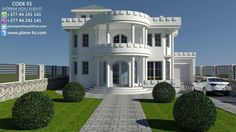 a large white house sitting on top of a lush green field