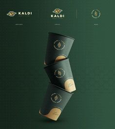 three black paper cups stacked on top of each other with the words kadi written in gold