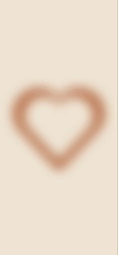 a heart shaped shadow on a beige background