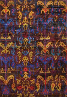 an area rug with various colored designs on it