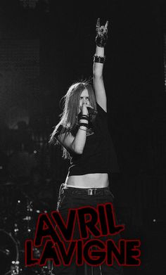 an advertisement for avril lavigne's concert with the singer holding her arm up