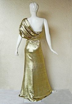 Reem Acra Golden Goddess Gown | From a collection of rare vintage evening dresses at https://www.1stdibs.com/fashion/clothing/evening-dresses/ Gold Strapless Gown For Gala, Strapless Gold Evening Gown, Gold Strapless Evening Gown, Glamorous Gold One Shoulder Dress With Asymmetrical Neckline, Glamorous Gold One-shoulder Dress With Asymmetrical Neckline, Glamorous Gold One-shoulder Dress For Gala, Glamorous Gold One-shoulder Dress For Formal Events, Gold Fitted One-shoulder Evening Dress, Gold Fitted One Shoulder Evening Dress