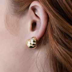 -large inflated dome stud earrings-15mm length by 10mm depth-this listing is for studs only. -all ear kit pieces are made from sterling silver. gold tone items are then plated in a thick layer of 18k gold studs are perfect on their own, but we suggest spicing them up with any of our plates, jackets, or connectors- for example, pair with: imogen studs or chunky chain connectors Oversized Stud Earrings, Edgy Silver Studs Jewelry, Silver Dot Stud Earrings, Gold Ball Stud Earrings, Silver Ball Stud Earrings, Bag Icon, Gold Studs, 18k Gold, Gold Tones