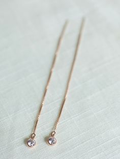 ∙ ∙ R O S E ∙ G O L D ∙ S P A R K L E ∙ T H R E A D E R ∙ E A R R I N G S ∙ ∙ Made with the following: 14K Rose Gold Filled Box Chain Threader Earring 14K Rose Gold Filled Wire 14K Rose Gold Filled Cubic Zirconia Pendant (4mm) The listing is for 1 pair of earrings. Approximately 3 1/2 inches in length total. Due to hygienic reasons, I do NOT accept returns or exchanges on earrings. __________________________________________________ ∙ ∙ H O W ∙ T O ∙ O R D E R ∙ ∙ Please select the length from th Chain Threader Earrings, Rose Gold Sparkle, Gold Sparkle, Threader Earrings, Box Chain, Jewelry Care, A R, Gold Filled, Cubic Zirconia