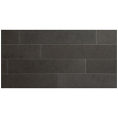 a black tile wall that has been made from dark grey tiles and is lined with white lines