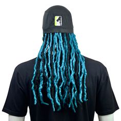 Stand out on game day with Fanlocks Teal and Black Dreadlocks hat. Dreadlocks and Skull Cap Compatible with other hats, caps and headgear Unisex One size fits most Material: Merino Wool Dreads, Cotton Blend Cap Wash By Hand Casual Black Festival Headwrap, Adjustable Black Headwrap Hat, Casual Black Costume Hat One Size, Rave Black Adjustable Costume Hat, Color Dreads, Black Dreadlocks, Carolina Football, Wool Dreads, The Skull