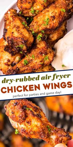 chicken wings are being held up in front of the camera, with text overlay that reads dry - rubbed air fryer chicken wings perfect for parties and game day