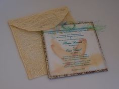 an image of a wedding card and envelope with string wrapped around the inside of it