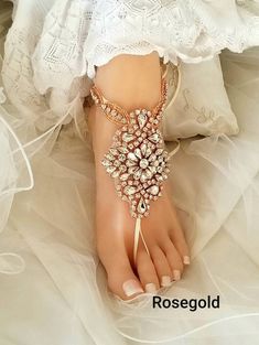 "--Vintage Foot Jewelry, Lavender Wedding Barefoot Sandals, Bridal Foot Jewelry, Silver Rhinestone Foot Jewelry, Footless Sandal- FT005 -- This stunning silver rhinestone footless sandal is the perfect accessory for a beach or garden wedding. This sandal is made clear rhinestone applique and silver satin ribbon. It is very comfortable and adjustable. Model in photo above is a US Size 7.5 . **This listing is for 1 PAIR (2 pcs) of barefoot sandals **Measurement** Applique Size: Approx 3.5\"L + 2.5 Wedding Barefoot Sandals With Rhinestones, Adjustable Rhinestone Barefoot Sandals For Wedding, Glamorous Wedding Sandals With Adjustable Fit, Glamorous Adjustable Wedding Sandals, Adjustable Gold Barefoot Sandals For Wedding, Summer Wedding Jewelry With Rhinestones, Vintage Wedding Sandals For Summer, Foot Jewelry Beach Wedding, Sandals Bridal