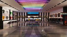 the interior of a clothing store with colorful lights on the ceiling