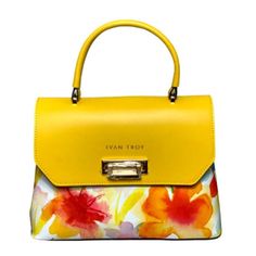 Ivan Troy Women's Ann Yellow Floral Print Italian Leather Strap Shoulder Handbag Material: Genuine Italian Leather Gold Metal Hardware Dimensions: H8” X W09” X D3” Made In Italy The Ivan Troy Italian Leather Floral Tote Top Handle Bag Is A Stylish And Fashionable Accessory Made From High-Quality Leather Materials. The Bag Features A Beautiful Floral Design That Adds A Touch Of Elegance And Sophistication To Any Outfit. Handbag Made In Italy And Designed To Be Worn Over The Shoulder. The Tote Bag Luxury Leather Satchel For Summer, Summer Formal Leather Bags, Formal Leather Bags For Summer, Summer Leather Bags With Gold-tone Hardware, Designer Yellow Bags For Summer, Luxury Yellow Shoulder Bag For Summer, Yellow Luxury Bag For Spring, Yellow Luxury Spring Bag, Luxury Yellow Spring Bag