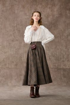 Modern Victorian Fashion Women, High Waist Brown Maxi Skirt For Fall, Chic Brown Maxi Skirt For Fall, Brown Asymmetrical Skirt For Fall, Pleated Flared Wrap Skirt For Fall, High Waist Flowy Brown Skirt, Elegant Brown Full Skirt Bottoms, High Waist Gathered Skirt For Fall, Elegant Brown Asymmetrical Skirt