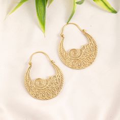 Elegant Ethnic Style Brass Hoop Earrings. Finely Decorated With Engraved Tribal Patterns. Wear it everyday or whatever the occasion. Indispensable for Boosting an Allure, they Catch the Eye, Reflect the Light and Highlight the Face. Material: Brass Color: Silvered or Golden Length: 5cm Width: 4cm Thickness: 0.2cm Weight: 14 GM per Pair Handmade Delivered in a Fabric Pouch Ideal for Gifting To offer or simply treat yourself, do not hesitate! *◅ ↠ ☽ ◅* + *▻ ☾  You May Pair Them with These Other Je Bohemian Teardrop Brass Hoop Earrings, Bohemian Spiral Nickel-free Hoop Earrings, Bohemian Spiral Hoop Earrings For Pierced Ears, Bohemian Spiral Hoop Earrings In Metal, Bohemian Spiral Metal Hoop Earrings, Gold Spiral Bohemian Earrings, Bohemian Gold Spiral Earrings, Bohemian Adjustable Spiral Hoop Earrings, Bohemian Metal Hoop Earrings For The Beach