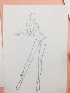 a drawing of a woman in tights and heels is shown on a piece of paper