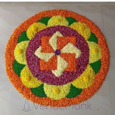 a colorful flower arrangement on the floor