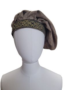 A renaissance staple!  Classic muffin cap style...  keep it plain to match all your outfits, or add some feather and button embellishments.    Made from a versatile, light brown jacquard fabric, and trimmed with brown and black jacquard trim. All edges are finished, and there is no elastic in the band.  If your head is smaller than these measurements, you may need to pin in place.  Standard shipping will ship Small Packets air mail, and take approx. 8 business days to arrive in Canada and the U. Sca Costumes, Medieval Hats, Elizabethan Era, Button Embellishments, Cap Style, Costume Hats, Jacquard Fabric, Girl Costumes, Larp