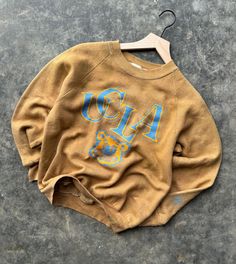 Vintage 90's UCLA Bruins Crewneck Sweatshirt Size Medium  20" x 23" Great graphics  Super soft & comfy Small Bruin sleeve hit  I custom Dyed this to a golden yellow color Any questions or additional info you need feel free to send a message. Thanks for looking, I add vintage items daily to the shop! Vintage Distressed Cotton Sweatshirt, Vintage Cotton Distressed Sweatshirt, Vintage Distressed Acid Wash Sweatshirt, Vintage Acid Wash Distressed Sweatshirt, Vintage Distressed Crew Neck Sweatshirt, Vintage Faded Washed Sweatshirt, Faded Vintage Washed Sweatshirt, Vintage Acid Wash Cotton Sweatshirt, Vintage Distressed Sweatshirt For Fall