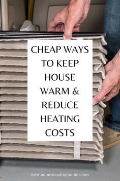 a man holding a stack of mattresses with the words cheap ways to keep house warm and reduce heating cost