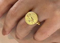 Discover the timeless elegance of our Gold Plated Handmade Roman-inspired Coin Rings, a perfect fusion of history and modern bohemian style. Each ring is meticulously handcrafted, ensuring that no two pieces are exactly alike, providing you with a truly unique statement piece. The gold plating gives these rings a luxurious sheen that captures the grandeur of ancient Roman aesthetics. Our adjustable rings are designed to fit any finger, making them an ideal and worry-free gift. The versatility of Rome Antique, Coin Ring, Bohemian Rings, Coin Jewelry, Modern Bohemian, Boho Stil, Gold Plated Necklace, Trendy Jewelry, Adjustable Rings