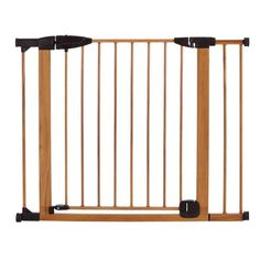 a wooden gate with two black handles on the top and bottom bars attached to it