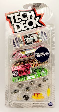 a package of skateboards with various designs on them