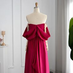 Off-Shoulder Glamour: This party dress boasts an off-shoulder design that adds a touch of sophistication and allure, making you the center of attention. Fuchsia Elegance: The dress features a striking fuchsia color that exudes vibrancy and sophistication, ensuring you make a bold and elegant statement. Long Sleeves: With elegant long sleeves, this dress offers both coverage and style, adding an extra layer of grace and charm to your look. Arabic Beaded Elegance: The dress is adorned with Arabic-inspired beadwork that adds a touch of opulence and glamour, creating a captivating and memorable appearance. Versatile Formalwear: Whether you're attending a wedding or a formal prom, this dress offers a captivating blend of style and versatility. Quality Craftsmanship: Meticulously crafted with at Mermaid Evening Gown, Full Dress, Evening Dress Fashion, Mermaid Gown, Fuchsia Color, Evening Party Dress, Prom Gown, Formal Gowns, Floor Length