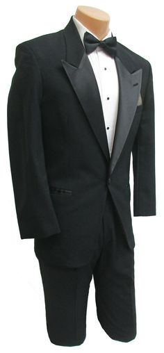 Boys Christian Dior Tuxedo Jacket This listing is for a handsome tuxedo jacket from our rental stock.  The Dior design features a one button single breasted front with satin peak lapels.  Non-vented back.  They are tailored in a high quality and very durable black 100% wool.  Fully lined interior.   Listing is for the jacket only.  Please visit my eBay store if you are interested in additional formal wear items. To purchase a new tuxedo shirt to go with your outfit please click here.  To see all Formal Blazer For Men, Blazer For Men Wedding, Wedding Ring Bearer, Formal Blazer, Blazer For Boys, Man Blazer, Tuxedo Shirt, Slim Fit Blazers, Tuxedo Shirts