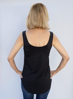 Take a look at our Black Rayon Modal Knit Tank Top Made out of a super soft rayon modal fabric Fabric content: 95% rayon modal, 5% spandex Color: Black Semi loose body with sides slightly shorter than front and back Straps are wide enough to wear a bra Round neck in front and back Back length is longer than front measuring at 21" Modal Tops With Built-in Bra For Loungewear, Casual Modal Tank Top With Built-in Bra, Black Modal Tank Top For Summer, Black 4-way Stretch Tops For Spring, Fitted Modal Casual Tank Top, Fitted Casual Modal Tank Top, Black Modal Tops For Summer, Black Stretch Modal Tank Top, Casual Tops With Built-in Bra And 4-way Stretch