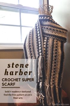 the stone harbor crochet super scarf is displayed in front of a window with text overlay