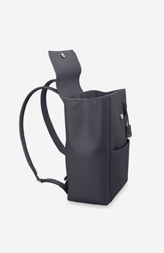 A chic and ultra-spacious office companion to refine your work-from-anywhere style. The Large Soft Backpack, handcrafted entirely from full-grain European leather, reimagines The Mini Soft Backpack with enhanced storage capability and increased all-day comfort. Featuring magnetic closure, a padded laptop sleeve to secure devices up to 16" and priority and zipped pockets to house valuables, the elegant carryall caters to every professional need. Crafted entirely from full grain sustainable DriTan Versatile Leather Backpack With Detachable Strap For Business, Leather Business Backpack With Detachable Strap, Business Leather Backpack With Detachable Strap, Classic Leather Office Backpack With Adjustable Strap, Classic Leather Backpack With Adjustable Strap For Office, Luxury Office Backpack With Detachable Strap, Elegant Office Backpack With Detachable Strap, Leather Work Backpack With Detachable Strap, Leather Backpack With Detachable Strap For Work