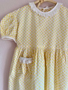 Vintage yellow and white toddler dress. Fits 3/4 T. Retro Yellow Cotton Dress, Vintage Yellow Short Sleeve Dress, Fitted Yellow Cotton Dress, Yellow Retro Short Sleeve Dress, Retro Yellow Short Sleeve Dress, Yellow Cotton Dresses With Ruffles, Yellow Cotton Dress With Ruffles, Yellow Cotton Daywear Dress, Yellow Cotton Dress For Daywear