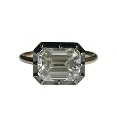 an emerald - cut diamond is displayed on a white background in this undsical photo