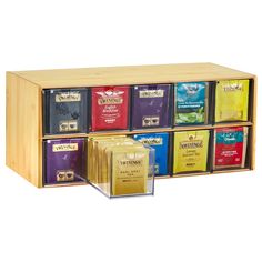 a wooden spice rack with six different types of spices and one is open to show the contents