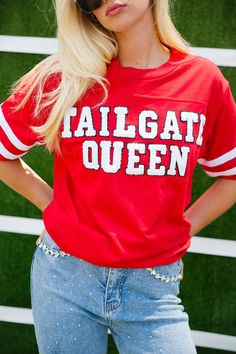 TAILGATE QUEEN RED VARSITY TEE TEE Judith March Varsity Fan Gear T-shirt With Lettering, Varsity Style Fan Gear T-shirt With Lettering, Varsity Lettering T-shirt For Fan Gear, School Spirit T-shirt For Tailgating, Red Varsity T-shirt For Fan Gear, School Spirit T-shirt For Tailgating With Crew Neck, School Spirit Crew Neck T-shirt For Tailgating, University Red Varsity Tops With Letter Print, Red Varsity T-shirt With Team Name