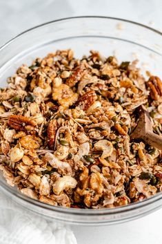 Amazing nut and seed granola made with cashews, pecans, walnuts, almonds, coconut & pumpkin seeds. This easy nut & seed granola recipe is gluten free and naturally sweetened with a bit of pure maple syrup. Truly a superwoman granola thanks to the healthy fats and additional nutrients from flax! #granola #seeds #nuts #healthysnack #snack #breakfast #glutenfree Copycat Purely Elizabeth Granola, Nut Granola Recipe