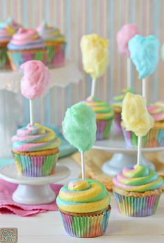 cupcakes with colorful frosting and candy on top