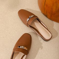 Trendy Formal Flat Slip-ons, Brown Pointed Toe Slip-ons For Office, Trendy Brown Slip-on Mules, Trendy Closed Toe Slip-ons For Work, Chic Flat Slip-ons For Office, Spring Office Slip-on Mules, Brown Pointed Toe Slip-ons For Spring, Brown Slip-on Mules For Fall, Business Mules For Spring With Flat Heel