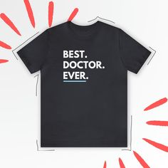 // DELIVERY UPDATE // The Christmas delivery deadline has passed. There are no guarantees of a Christmas delivery. Please use caution when ordering against a tight deadline. This Best Doctor Shirt is the perfect gift or present for any Doctor of PHD grad. Get a laugh with this funny Doctor t shirt. You are buying a custom shirt for anyone. This classic popular shirt fits like a well-loved favorite. Soft cotton and fun graphics make it a perfect gift. These t-shirts have ribbed knit collars to bolster shaping. 🙂🙂 This is a high-quality shirt, made to be comfortable and last. This is not a cheap, itchy shirt that will stretch and shrink. You will LOVE wearing this shirt. We care about comfort and quality! HERE'S THE DEAL ON OUR TEES - This premium fitted short sleeve is a popular retail qu Funny Pilot, Doctor Graduation, Phd Graduation, Pilot T Shirt, Fun Graphics, Pilot Shirt, Airplane Pilot, Doctorate Degree, Doctor Humor