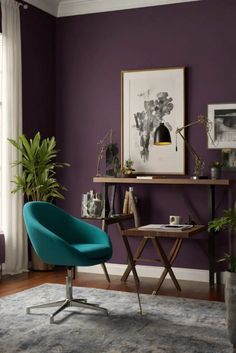 a living room with purple walls and blue chair in front of a desk, potted plant on top of the table